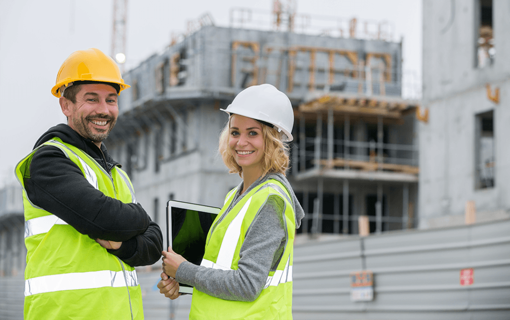 Male and female construction workers representing a gender gap in construction
