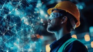 Construction worker using advanced technology to review project status