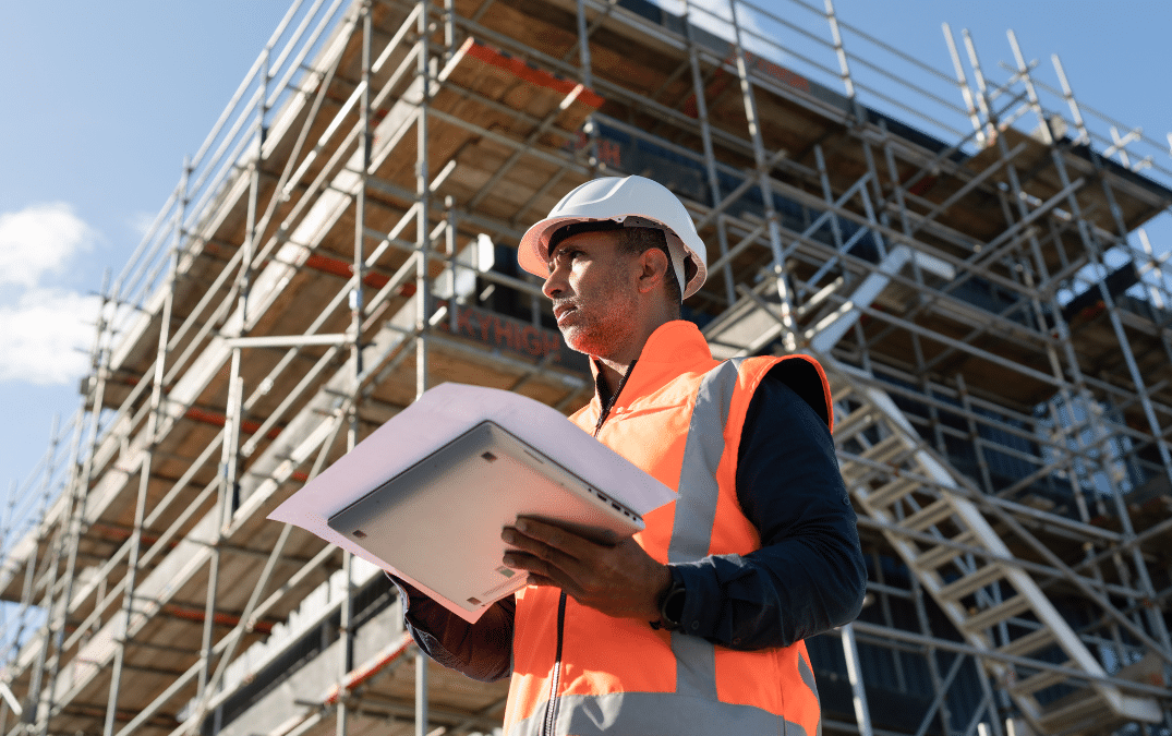 Construction manager making key decisions at a job site