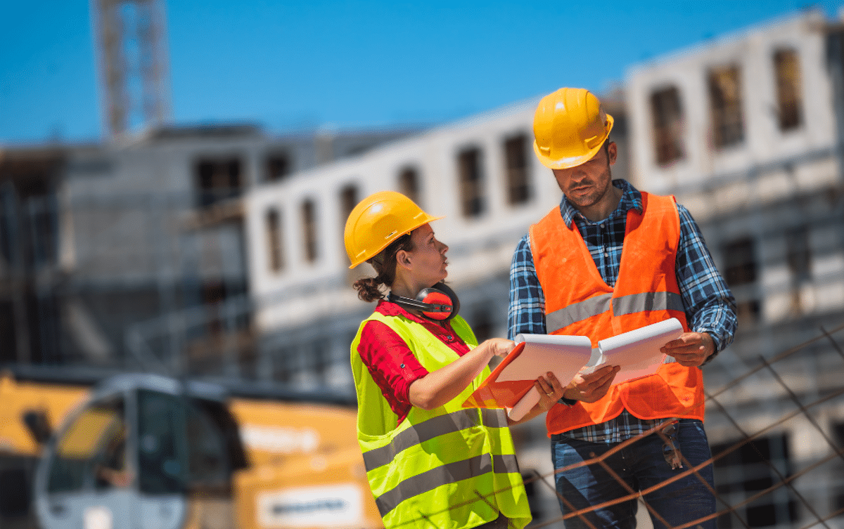 Construction project managers working together in the field